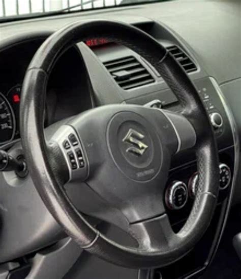 Преимущества и недостатки функционала кнопки Suzuki SX4